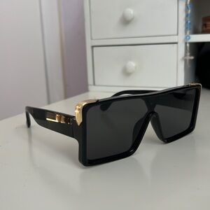Three pairs of sunglasses